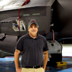 Here I am with USAF fighter jet being preped for a test flight.